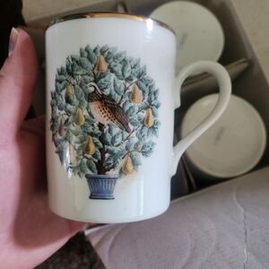 Twelve days of Christmas mugs by Avon.